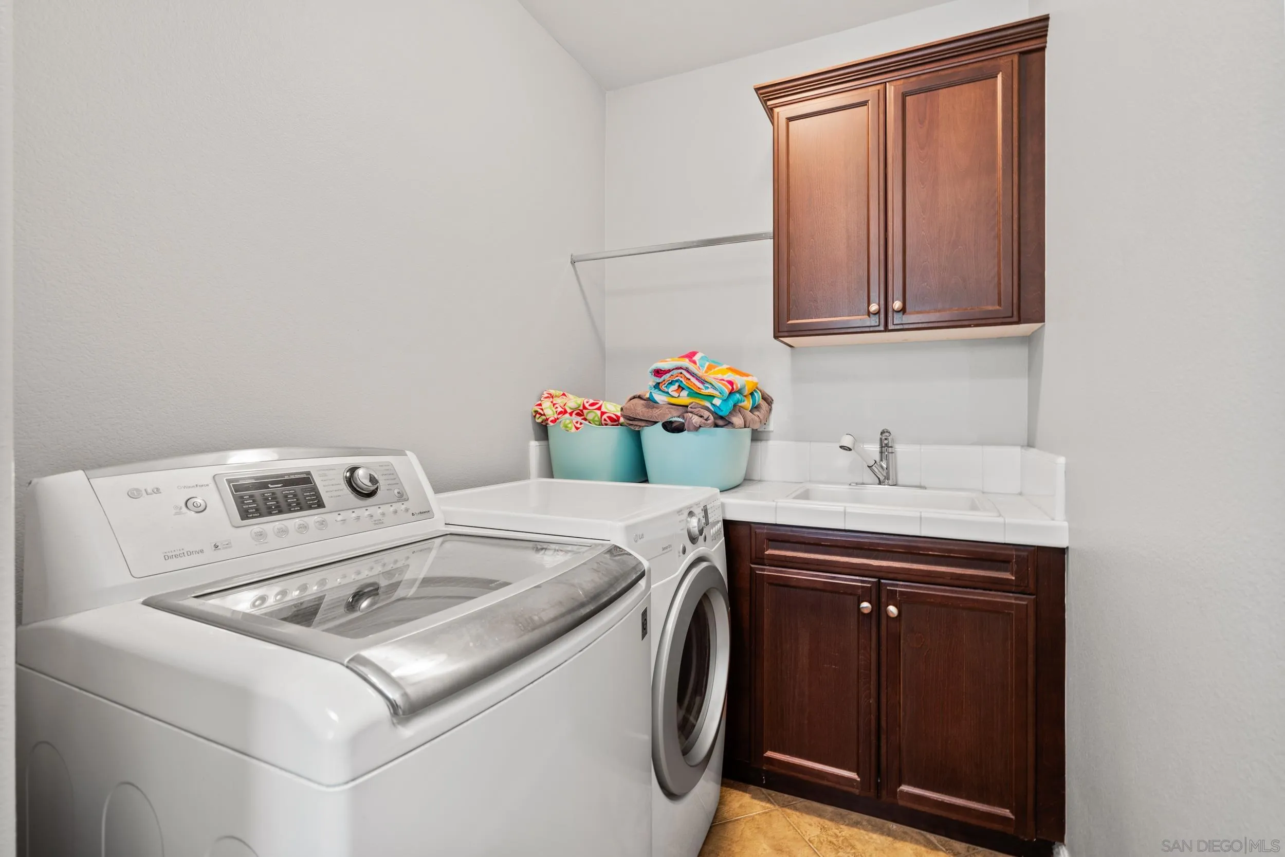 16174 Cayenne Ridge Road San Diego, CA 92127 - Photo 12 of 52 a utility room with dryer and washer