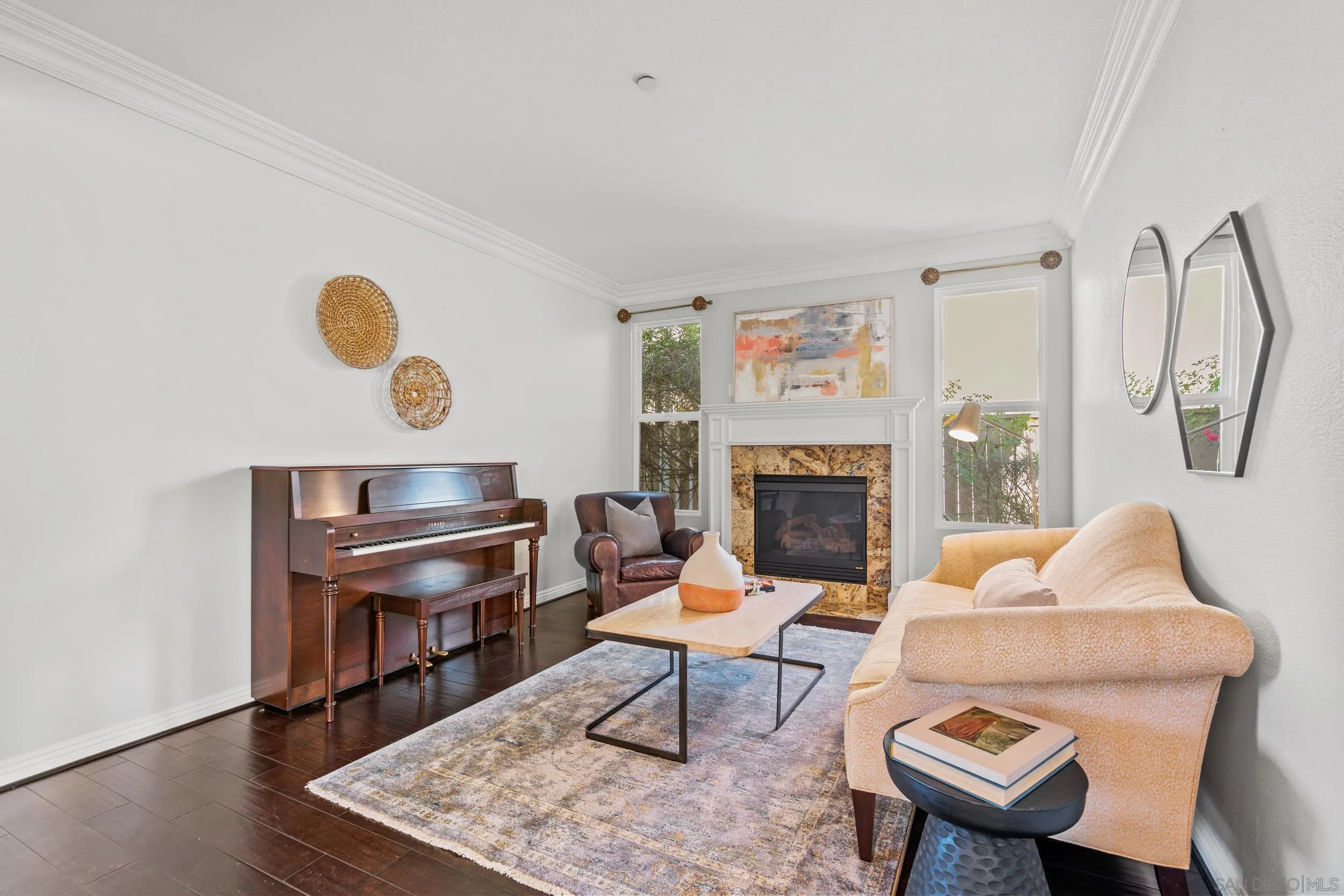 16174 Cayenne Ridge Road San Diego, CA 92127 - Photo 14 of 52 a living room with furniture and a fireplace