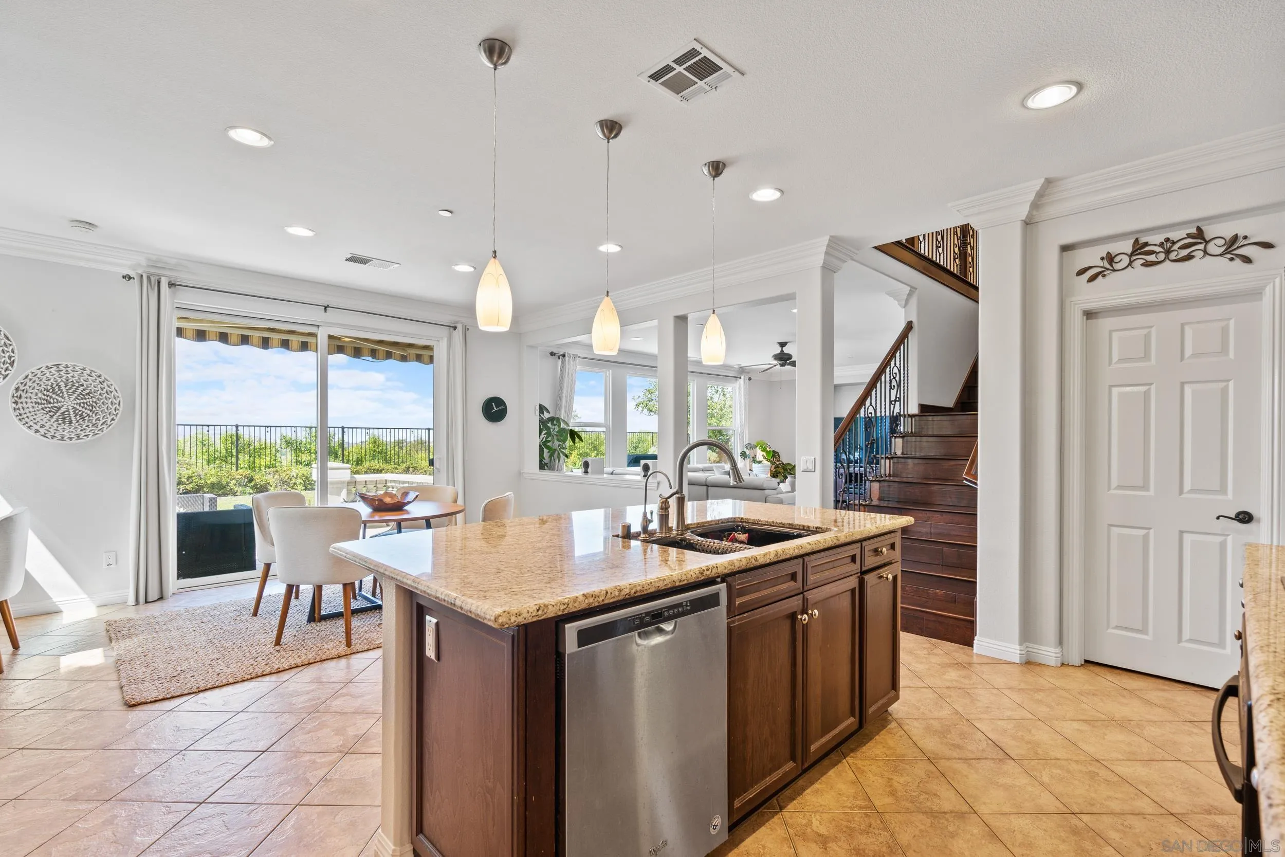 16174 Cayenne Ridge Road San Diego, CA 92127 - Photo 18 of 52 a kitchen with a sink and stove