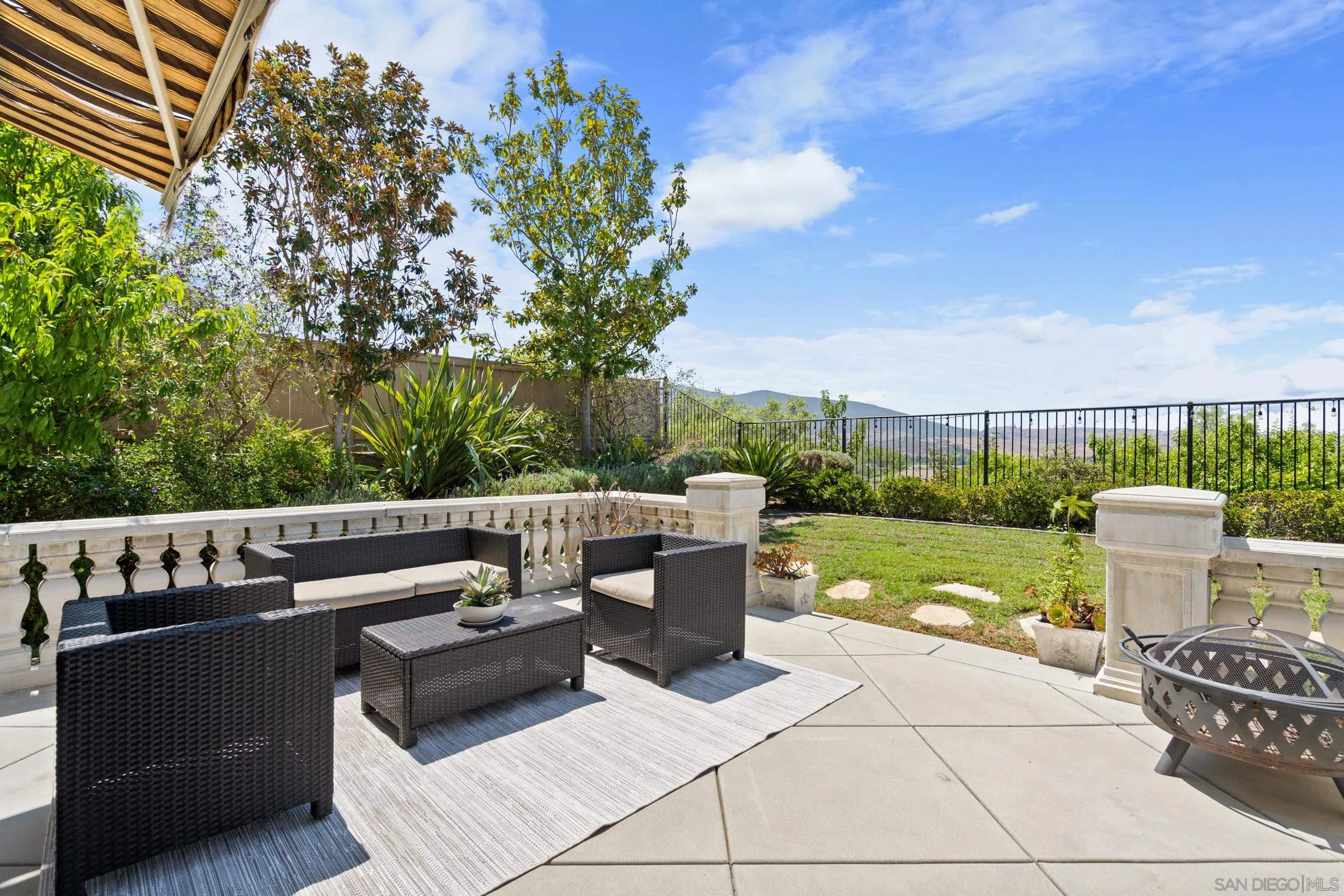 16174 Cayenne Ridge Road San Diego, CA 92127 - Photo 24 of 52 a view of a roof deck with couches and wooden floor