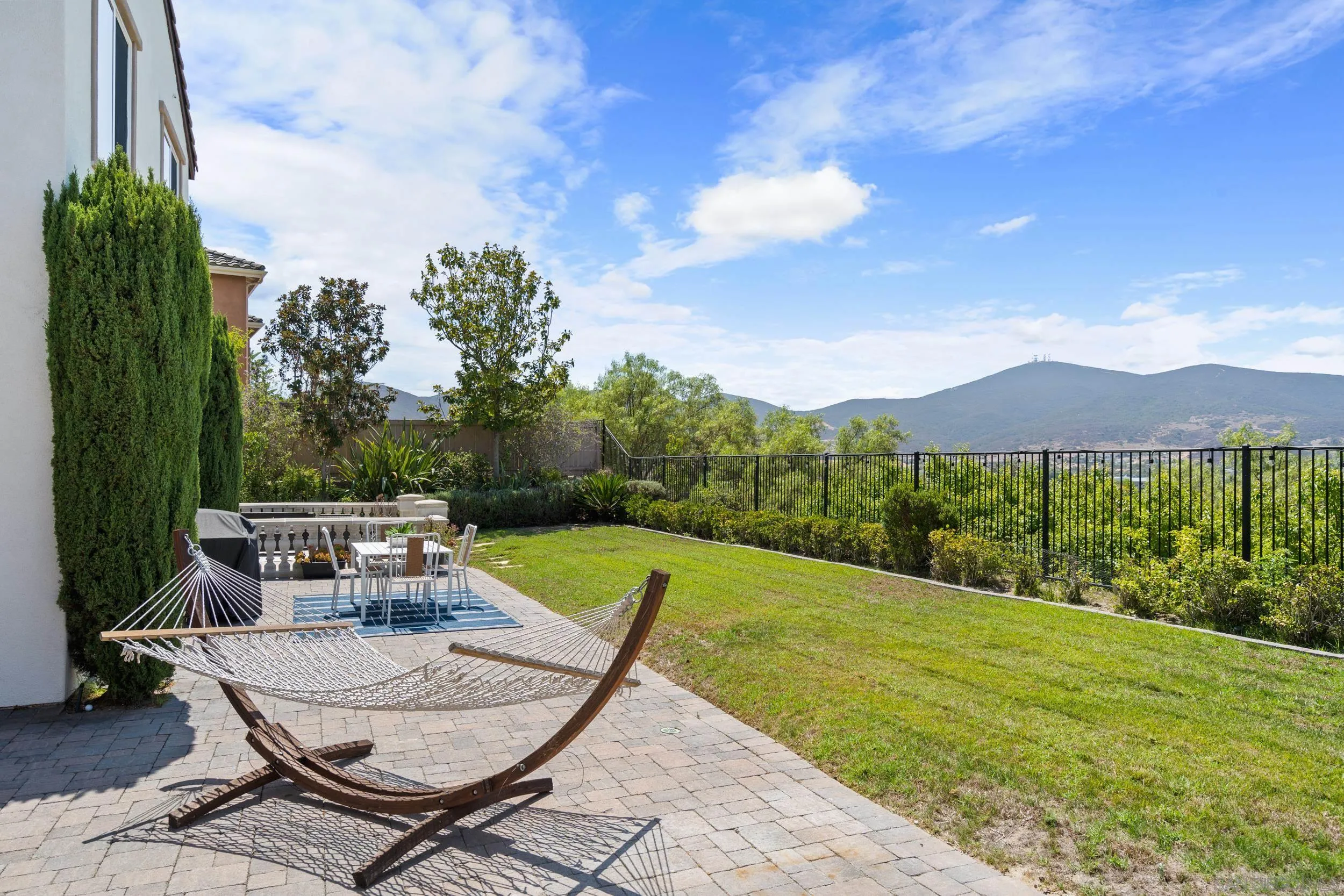 16174 Cayenne Ridge Road San Diego, CA 92127 - Photo 25 of 52 a view of a backyard with sitting area