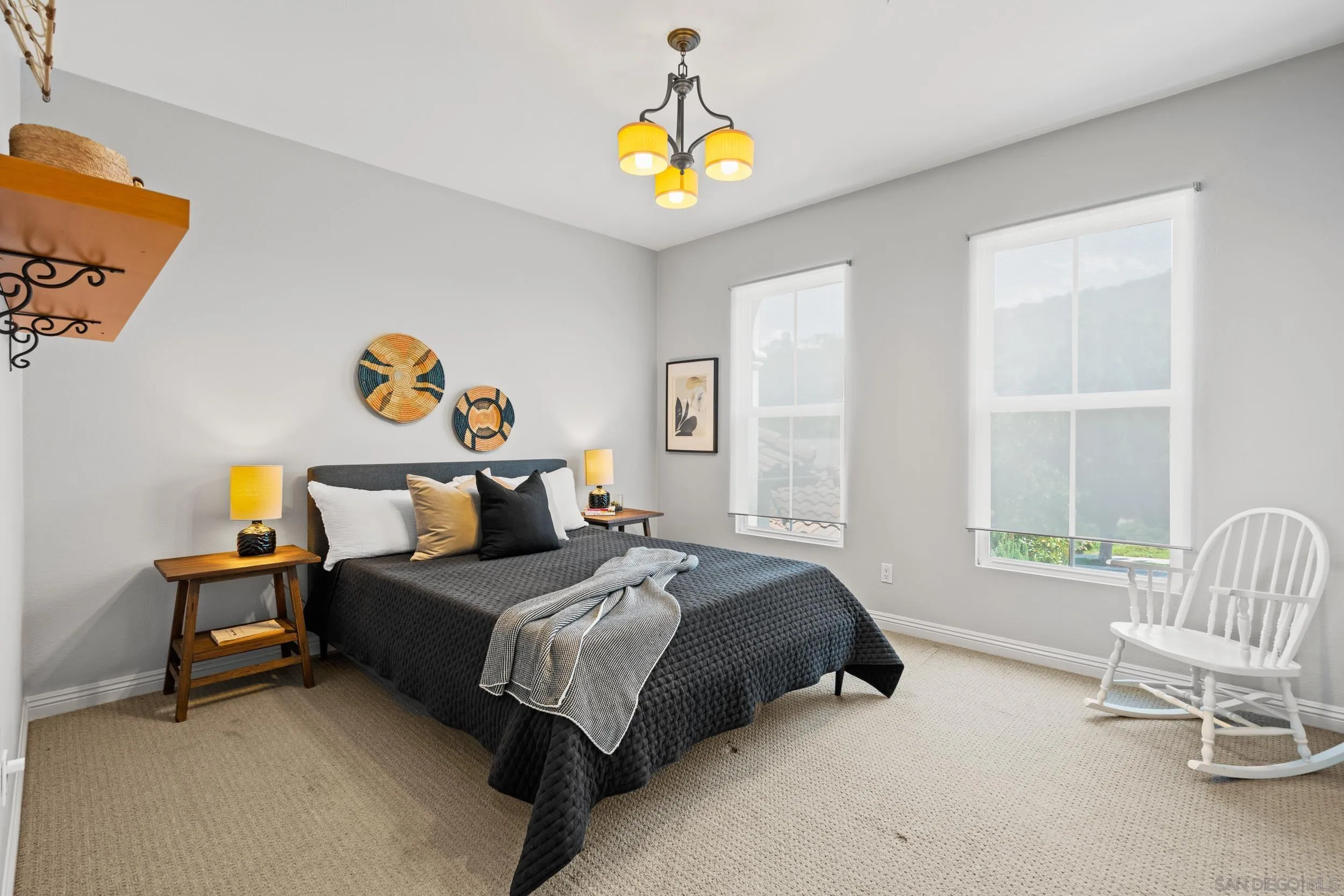 16174 Cayenne Ridge Road San Diego, CA 92127 - Photo 27 of 52 a bedroom with a bed and a window