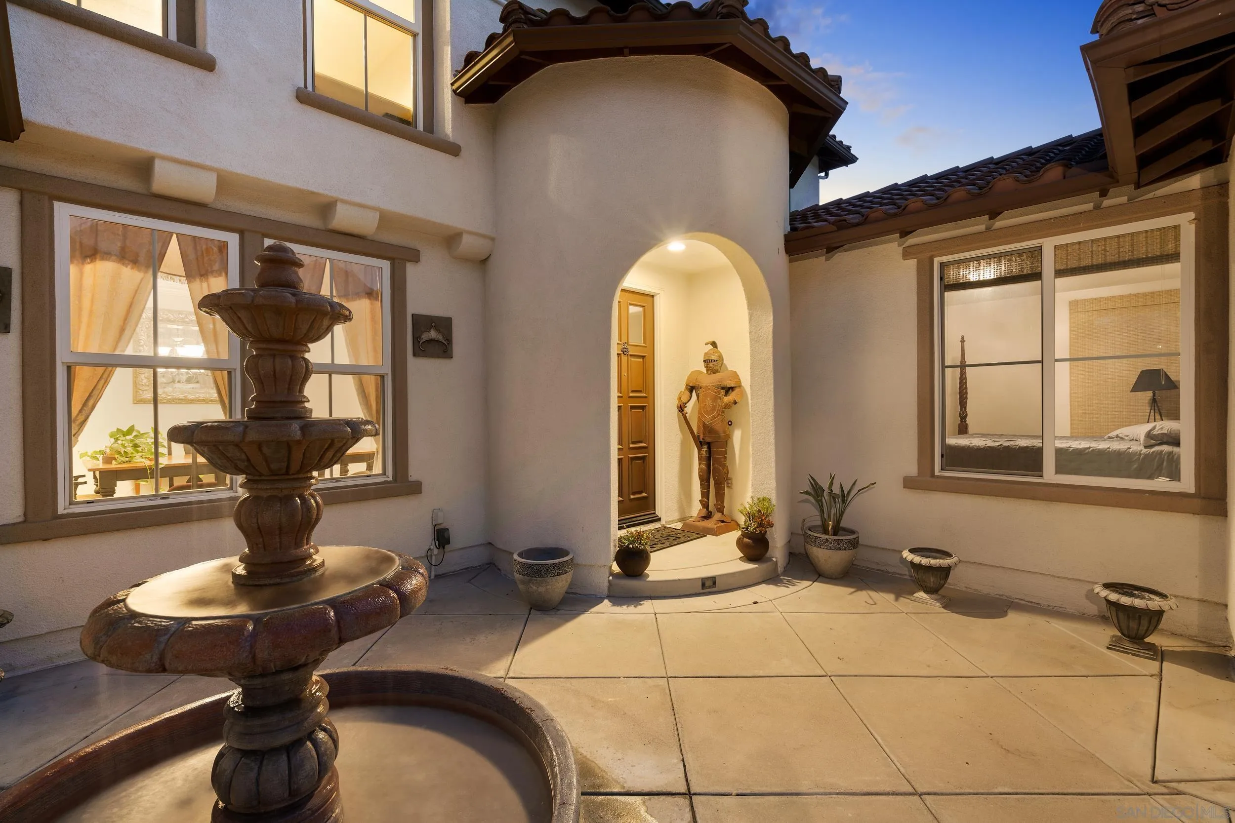 16174 Cayenne Ridge Road San Diego, CA 92127 - Photo 3 of 52 a room with gym equipment and windows