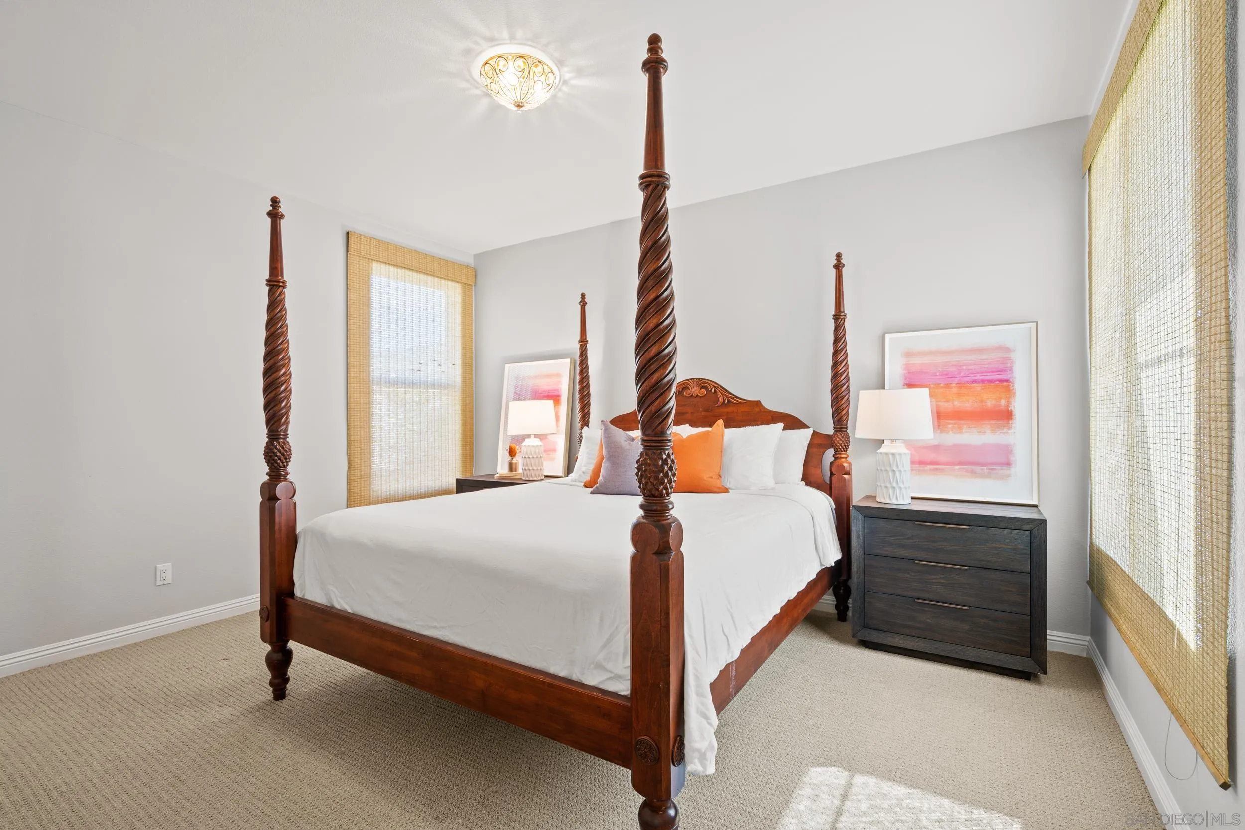 16174 Cayenne Ridge Road San Diego, CA 92127 - Photo 32 of 52 a bedroom with a bed a window and dresser