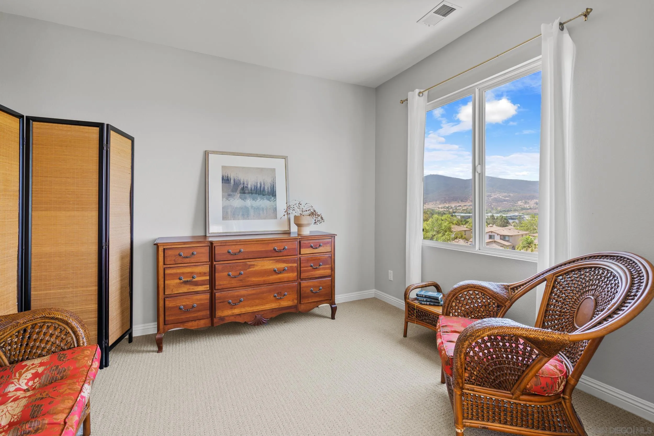 16174 Cayenne Ridge Road San Diego, CA 92127 - Photo 38 of 52 a room with furniture and window