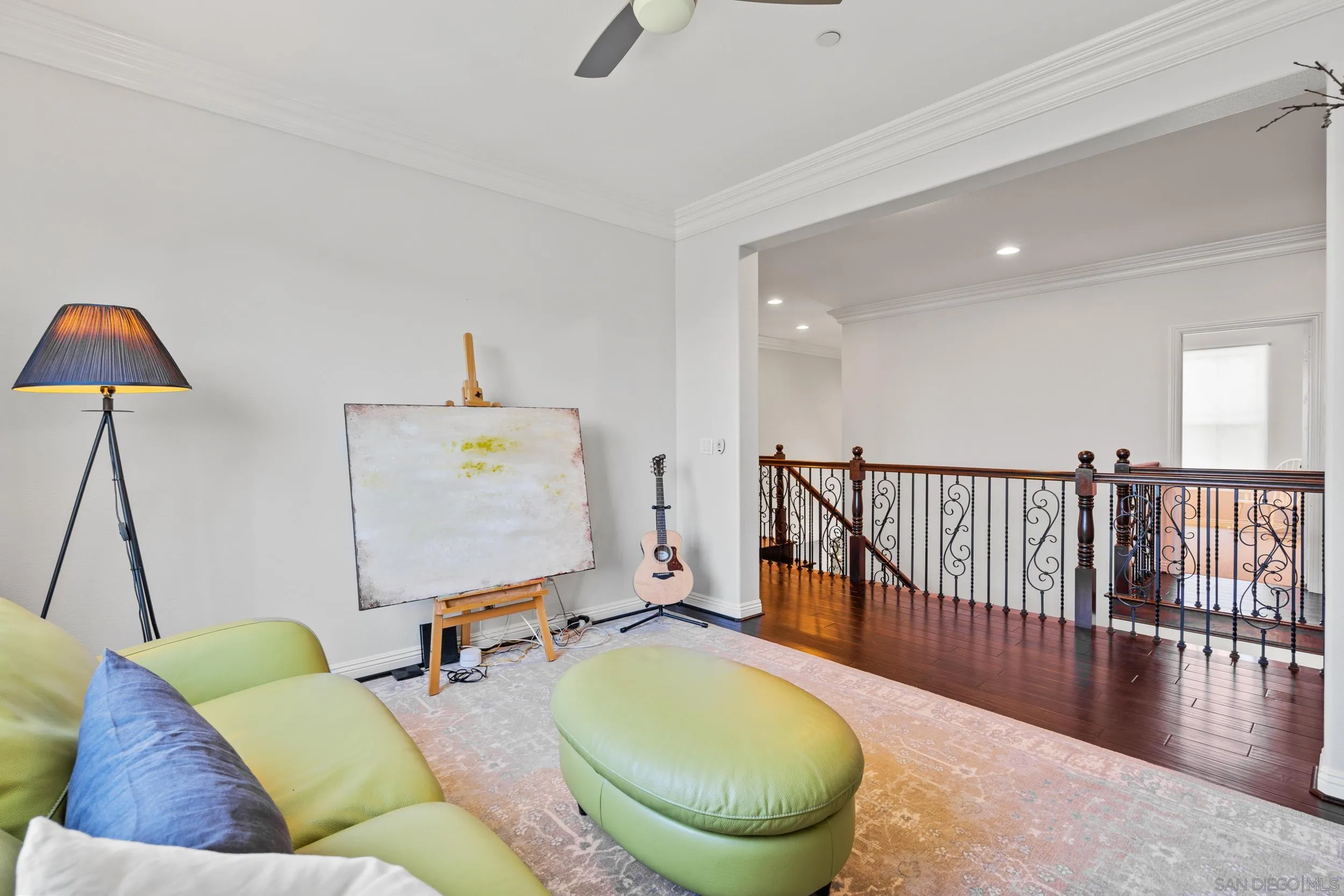 16174 Cayenne Ridge Road San Diego, CA 92127 - Photo 42 of 52 a living room with furniture and a flat screen tv