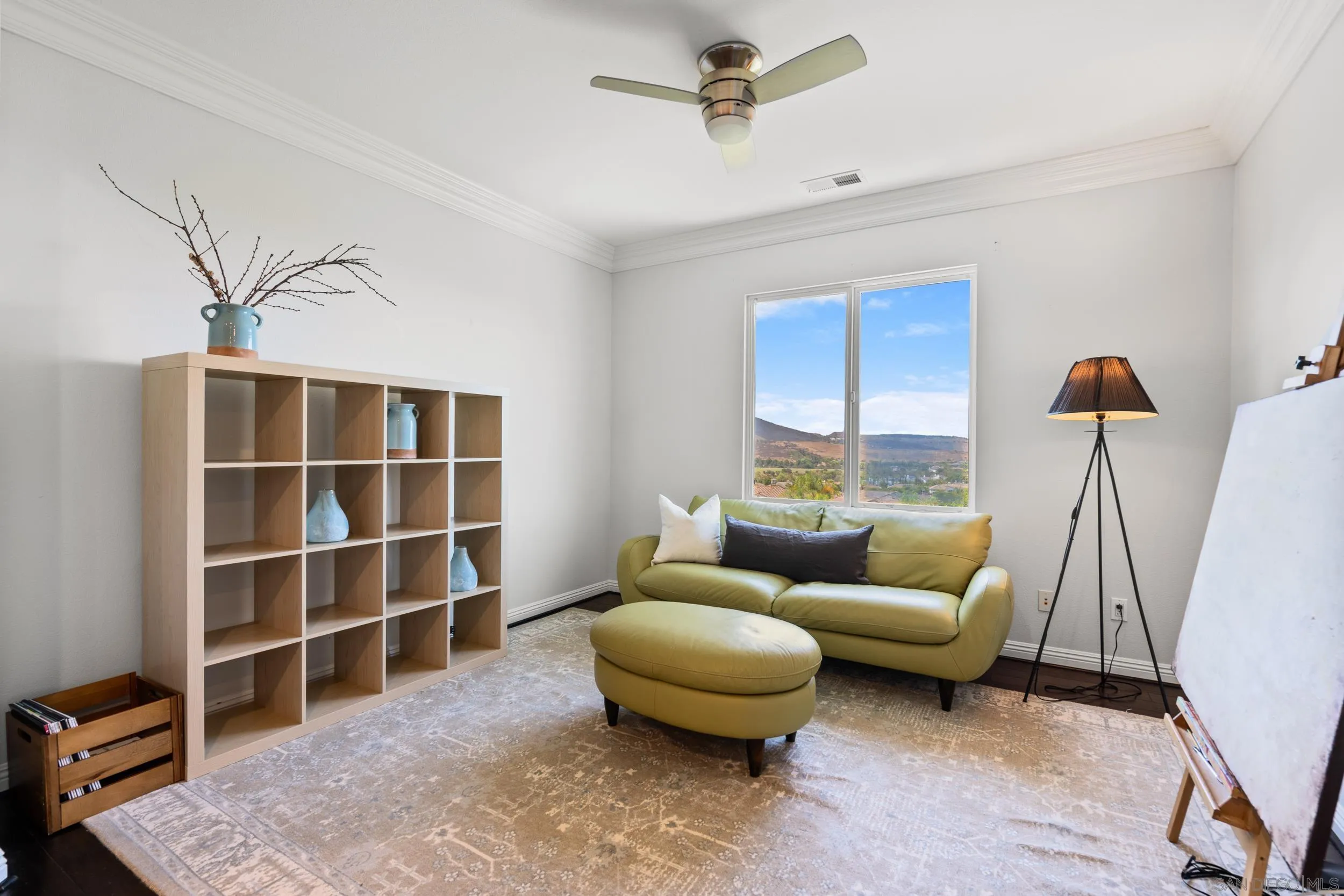 16174 Cayenne Ridge Road San Diego, CA 92127 - Photo 43 of 52 a living room with furniture and a rug