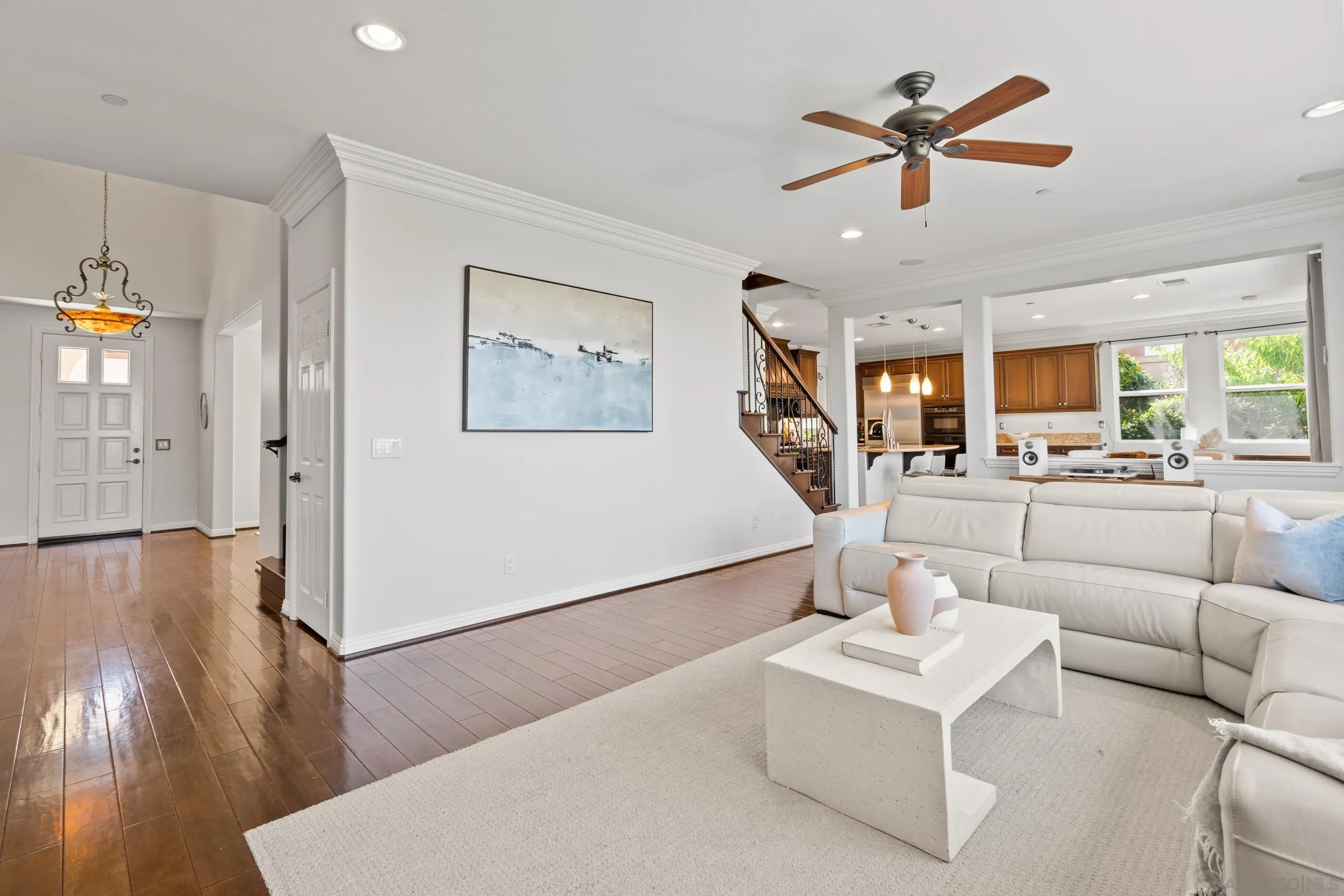 16174 Cayenne Ridge Road San Diego, CA 92127 - Photo 8 of 52 a living room with furniture and view of kitchen