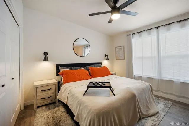 a bedroom with a bed and window