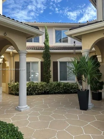 a view of a house with a patio