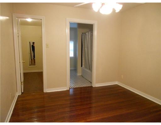 713 Ralston Avenue Corpus Christi, TX 78404 - Photo 6 of 10 a view of empty room with wooden floor