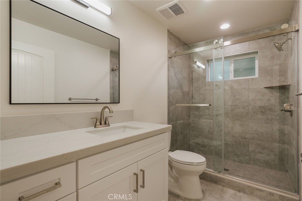 1806 South 8th Street, Unit B Alhambra, CA 91803 - Photo 41 of 44 a bathroom with a sink a toilet and shower