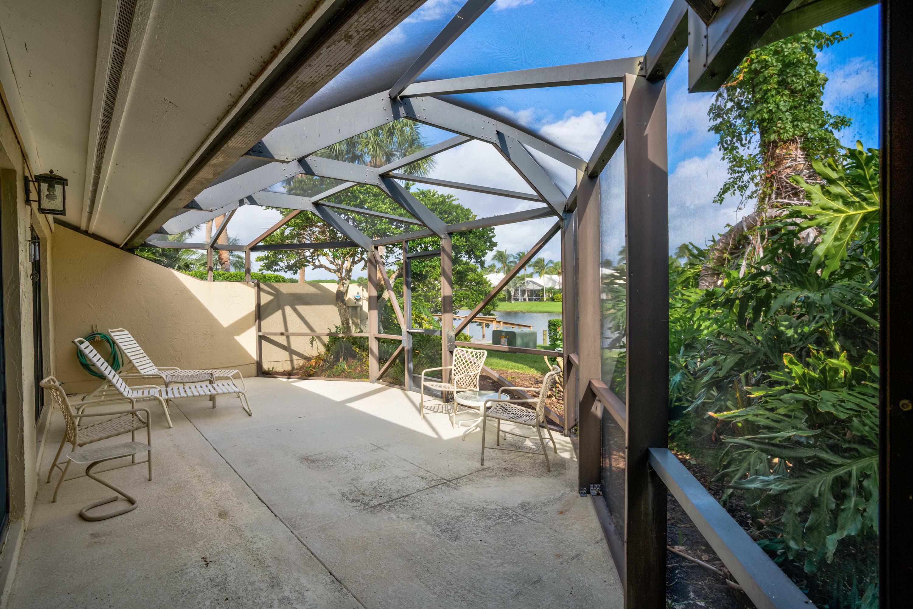3673 Cape Pointe Circle Jupiter, FL 33477 - Photo 17 of 37 Covered Patio