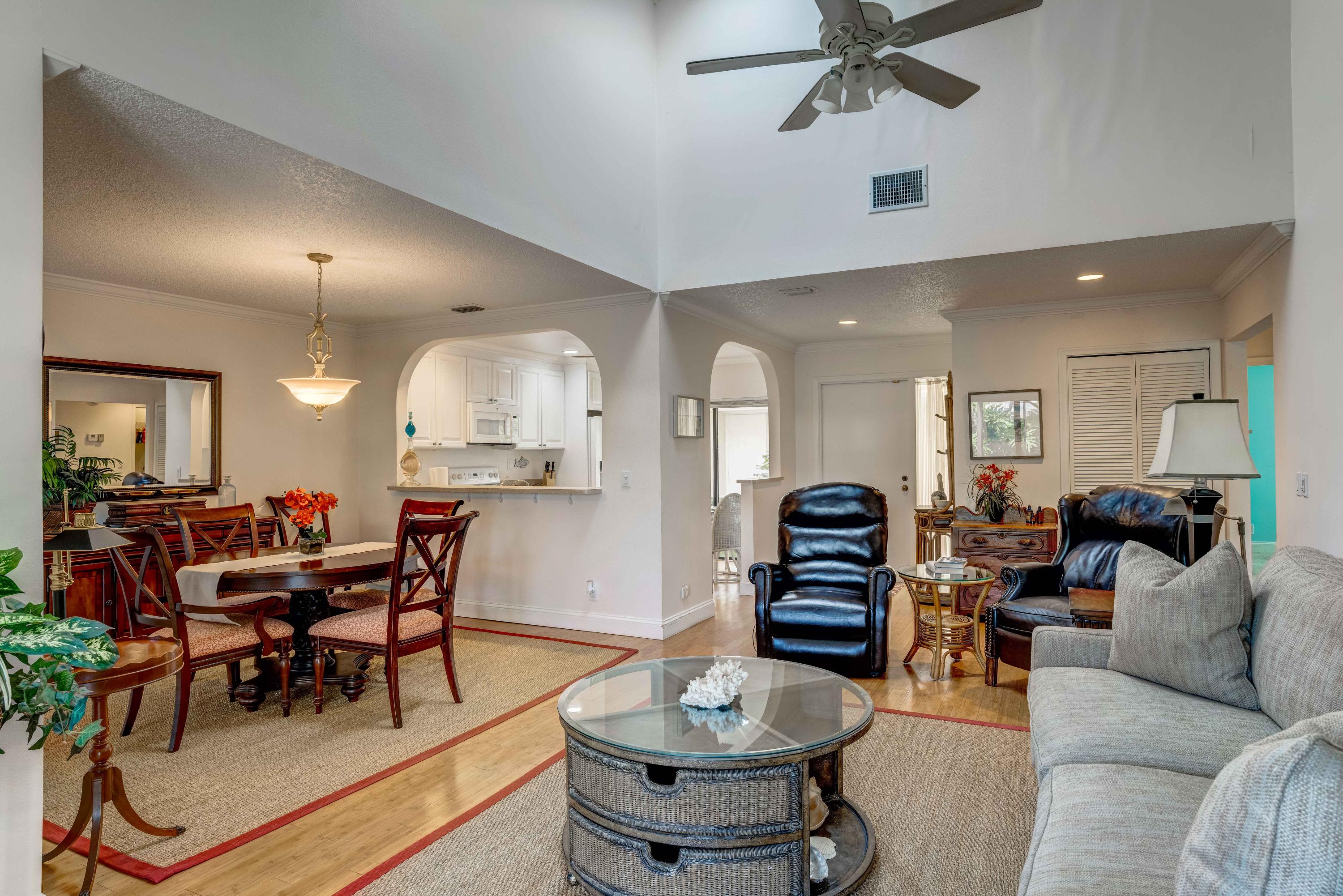 3673 Cape Pointe Circle Jupiter, FL 33477 - Photo 20 of 37 Dinning & Living Area from the Patio