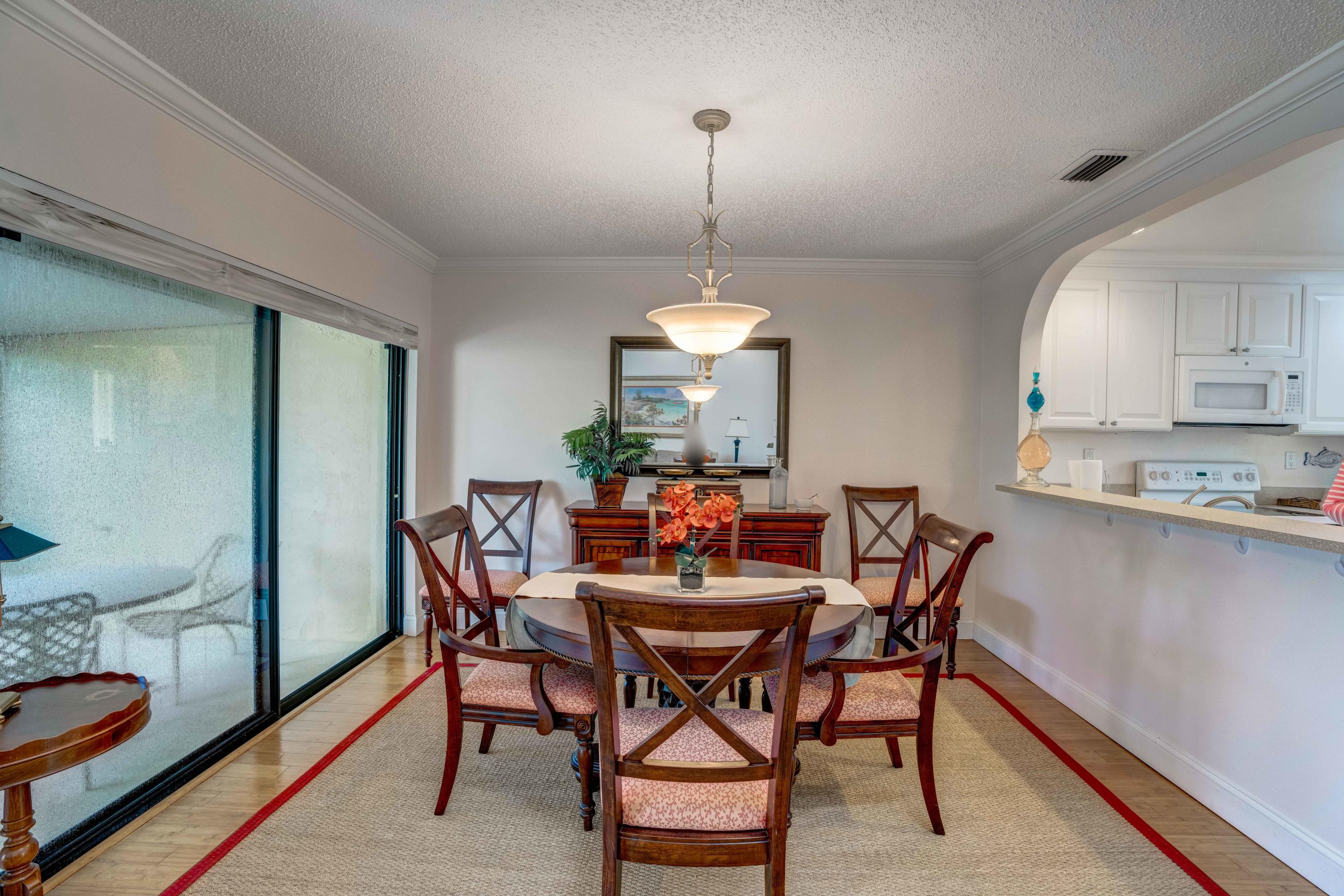 3673 Cape Pointe Circle Jupiter, FL 33477 - Photo 22 of 37 Dinning Area
