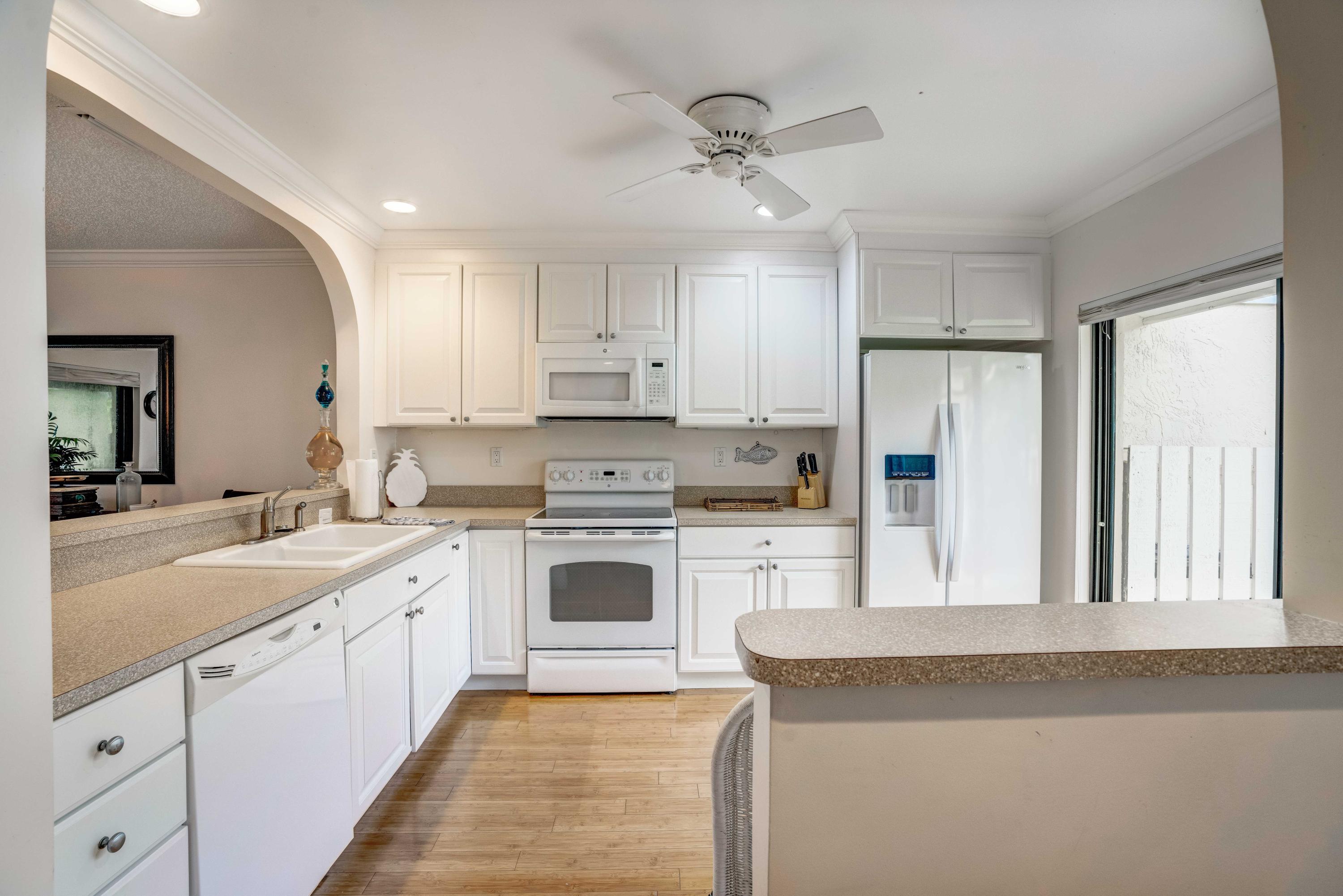 3673 Cape Pointe Circle Jupiter, FL 33477 - Photo 24 of 37 Kitchen