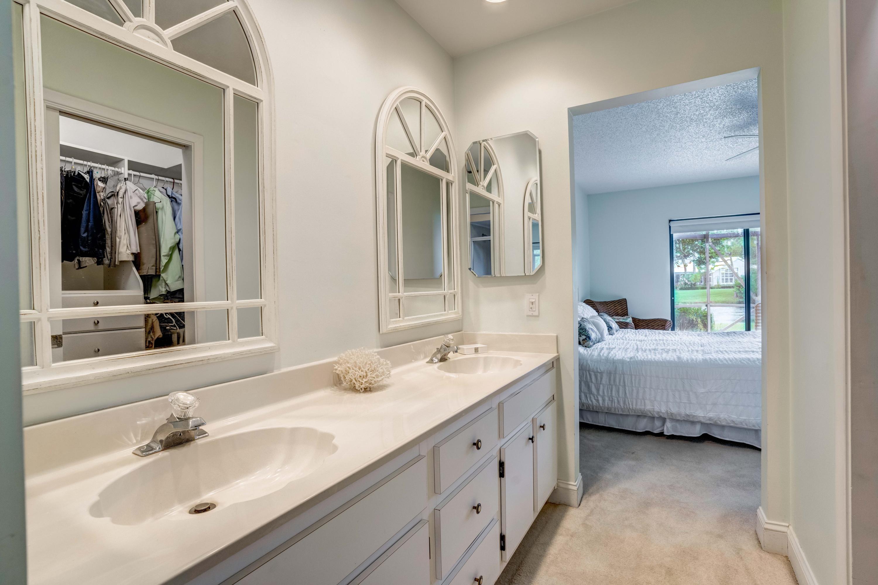 3673 Cape Pointe Circle Jupiter, FL 33477 - Photo 31 of 37 Master Bath looking into Master Bedroom