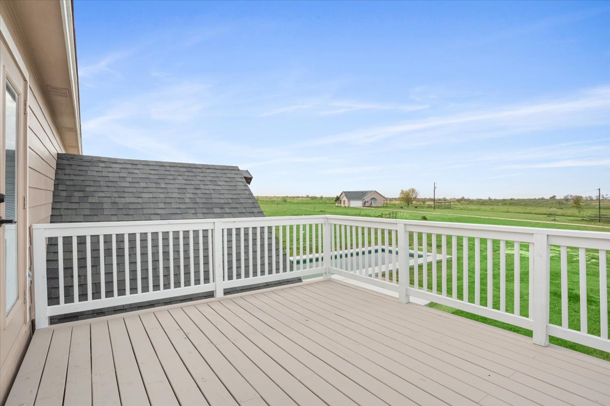 8600 Five Wells Road Rogers, TX 76569 - Photo 17 of 40 a view of wooden deck and city view