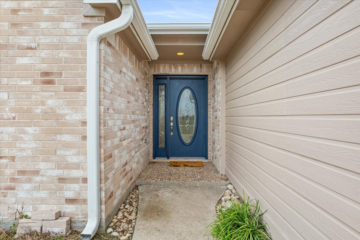 8600 Five Wells Road Rogers, TX 76569 - Photo 28 of 40 a front view of a house with a hallway