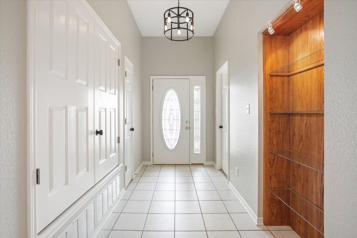 8600 Five Wells Road Rogers, TX 76569 - Photo 29 of 40 a view of a entrance to room with wooden floor