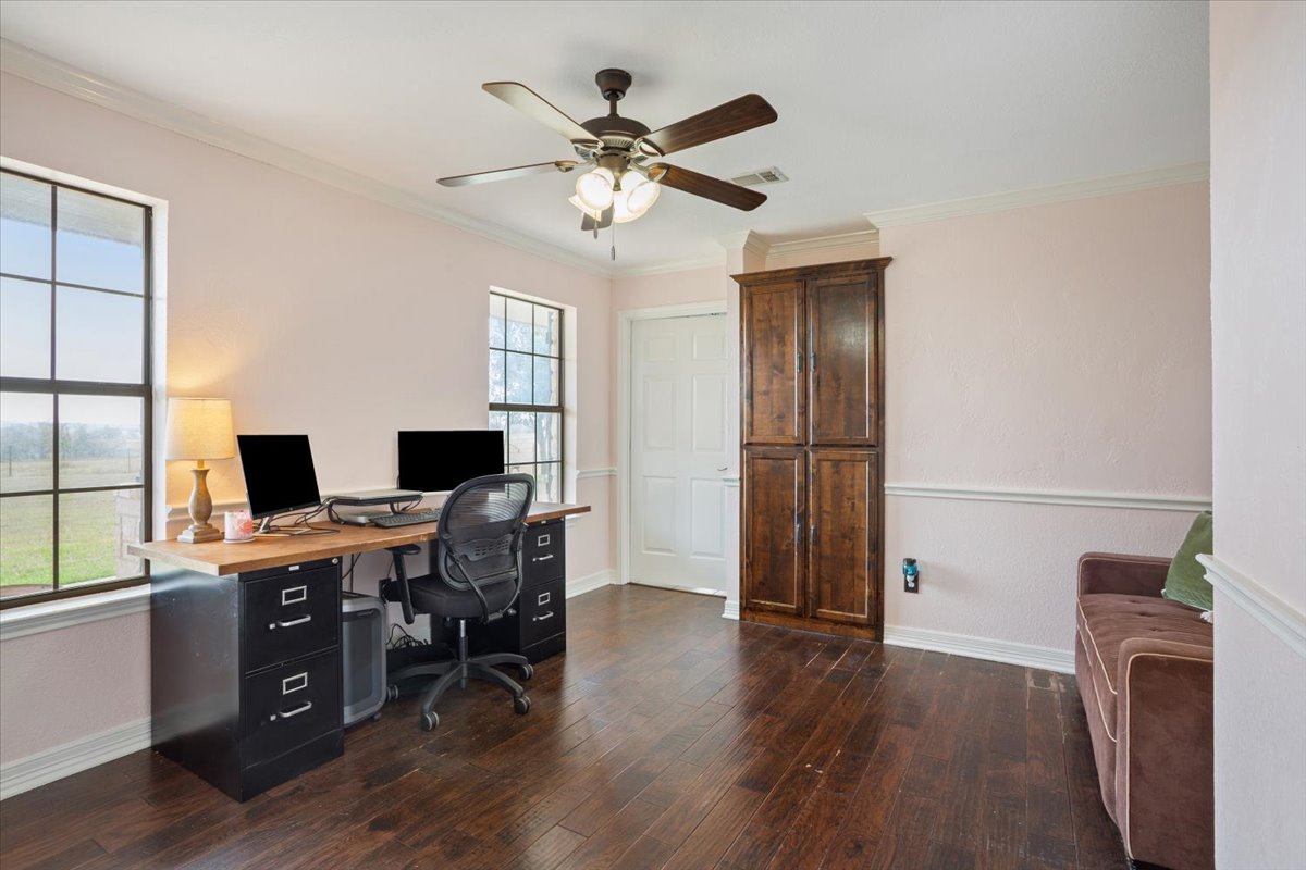8600 Five Wells Road Rogers, TX 76569 - Photo 6 of 40 a workspace with wooden floor and a window
