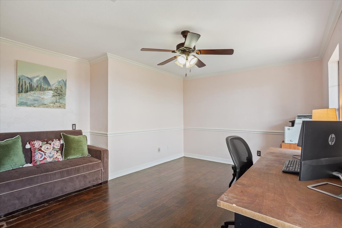 8600 Five Wells Road Rogers, TX 76569 - Photo 7 of 40 a view of a workspace with furniture and a couch