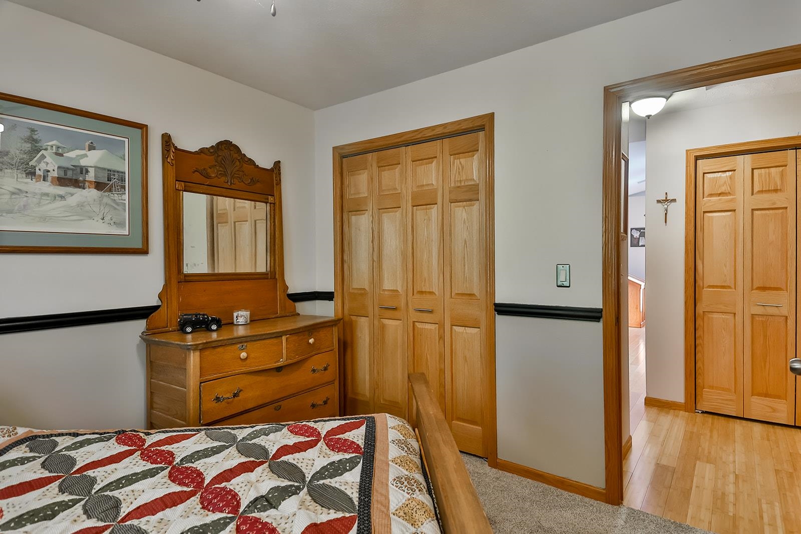 245 Rochester Road Northeast Poplar Grove, IL 61065 - Photo 18 of 29 a bedroom with a bed and wooden floor