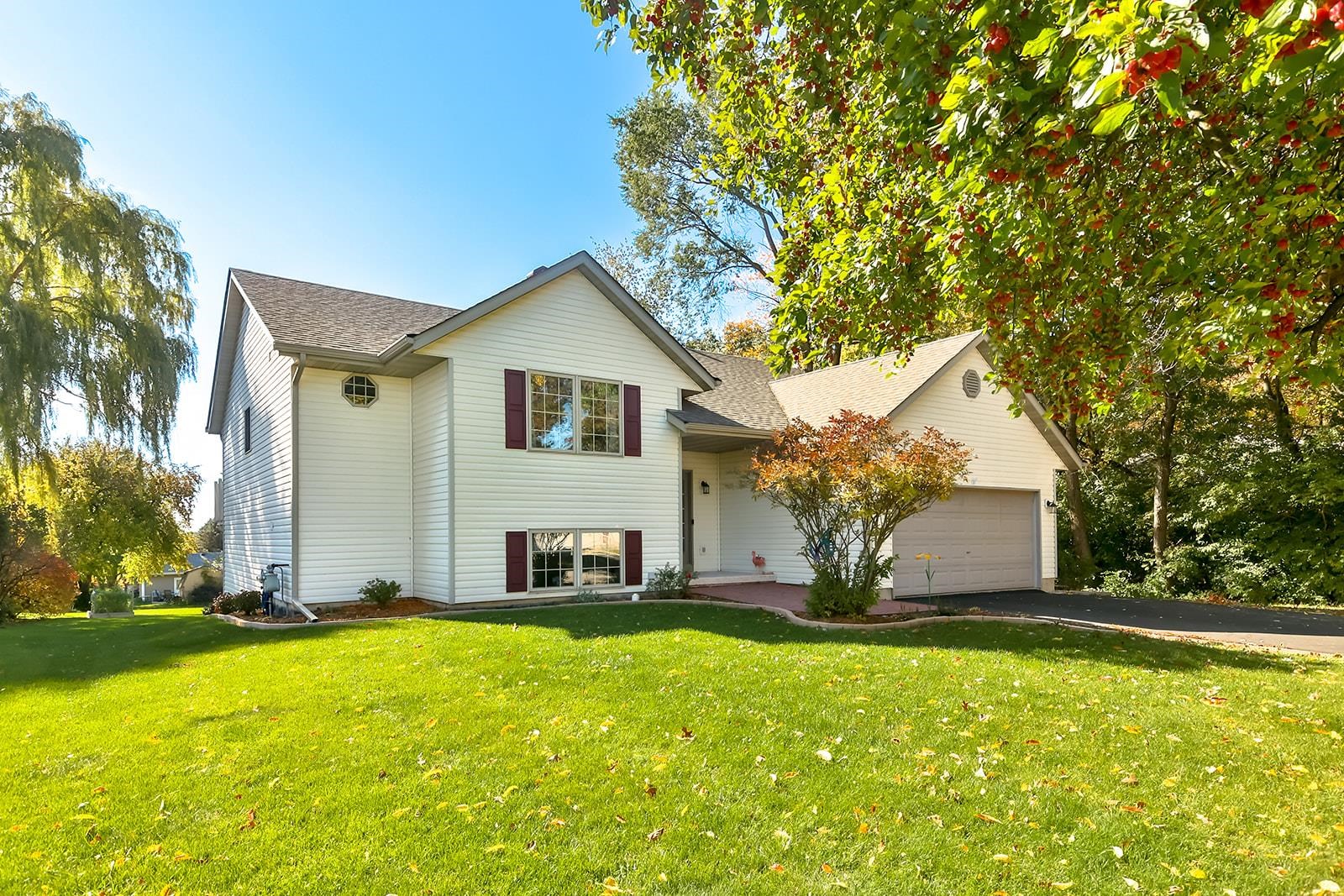 245 Rochester Road Northeast Poplar Grove, IL 61065 - Photo 2 of 29 a view of a house with a yard