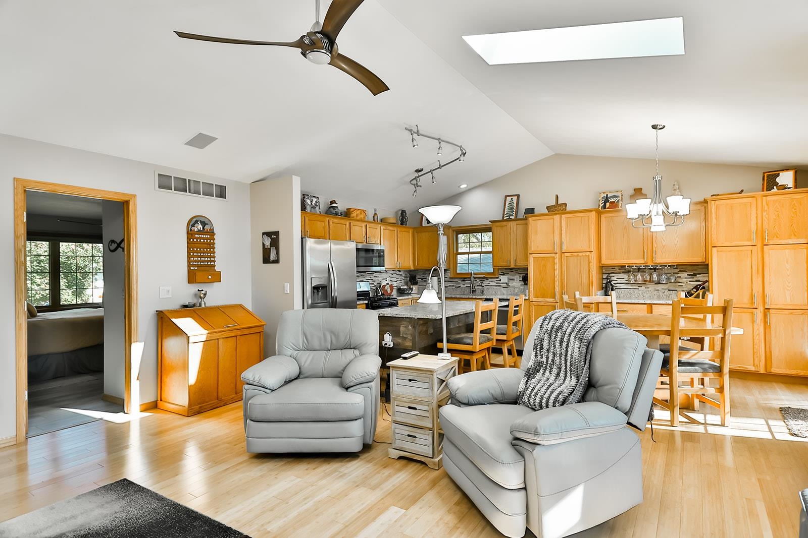 245 Rochester Road Northeast Poplar Grove, IL 61065 - Photo 5 of 29 a living room with furniture and wooden floor