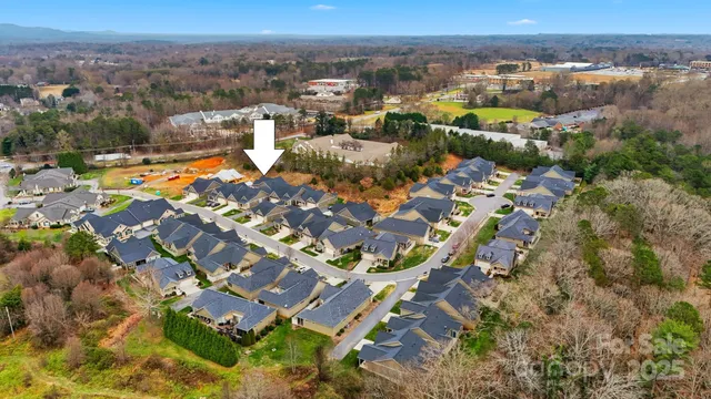 an aerial view of a city with lots of residential buildings