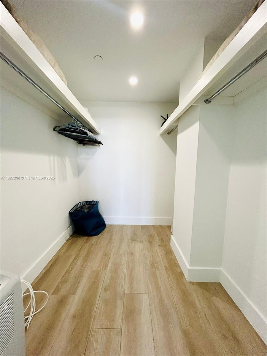 100 Lincoln Road, Unit 1429 Miami Beach, FL 33139 - Photo 11 of 13 a view of a room with wooden floor