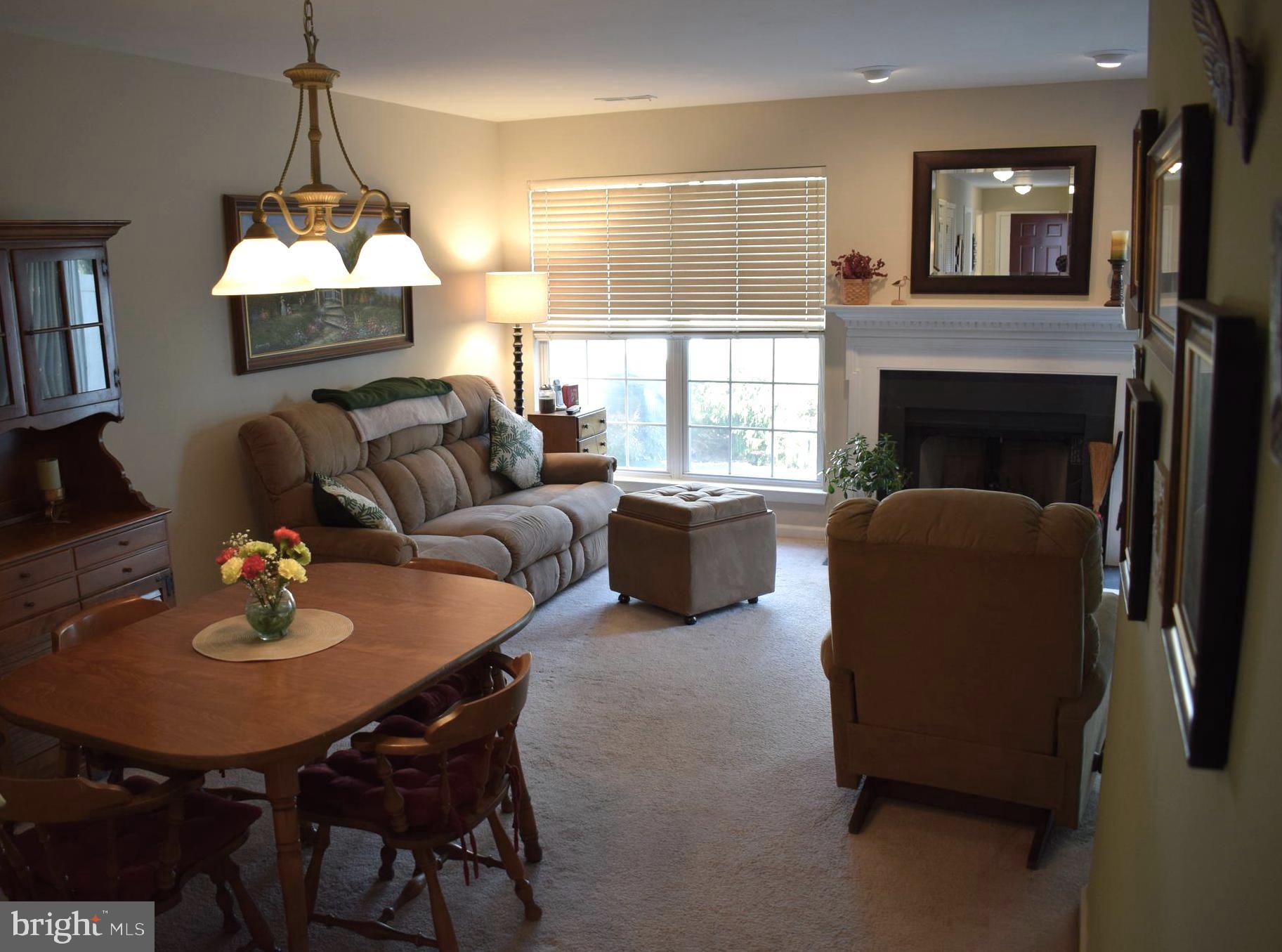 1303 Waterford Road Yardley, PA 19067 - Photo 10 of 32 Living Room w/Fireplace, sliding door to patio