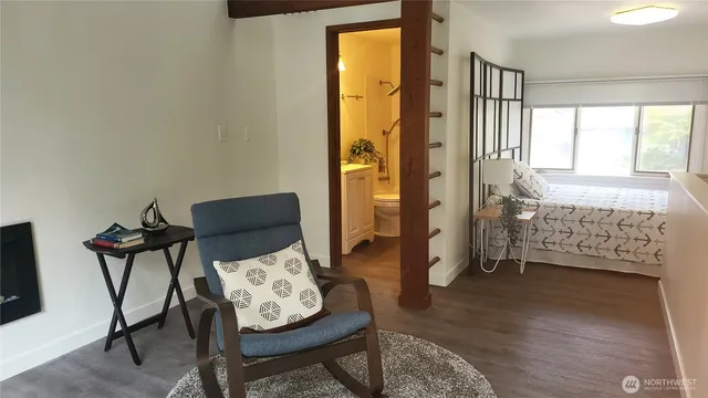 a living room with furniture and a window