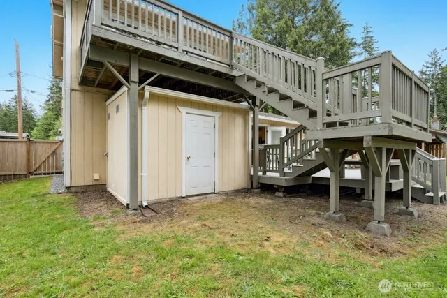 a view of a house with wooden walls
