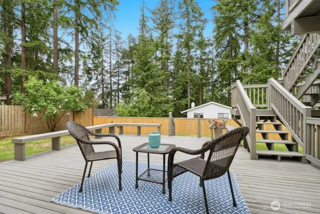 a view of a chairs and table on the wooden floor