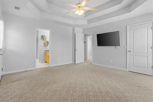 a bathroom with a sink vanity and mirror