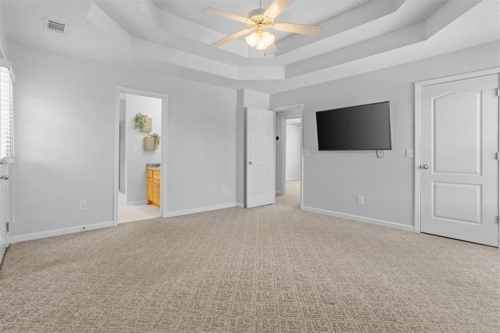12 Moorings Run Jasper, GA 30143 - Photo 17 of 54 an empty room with closet and a flat screen tv