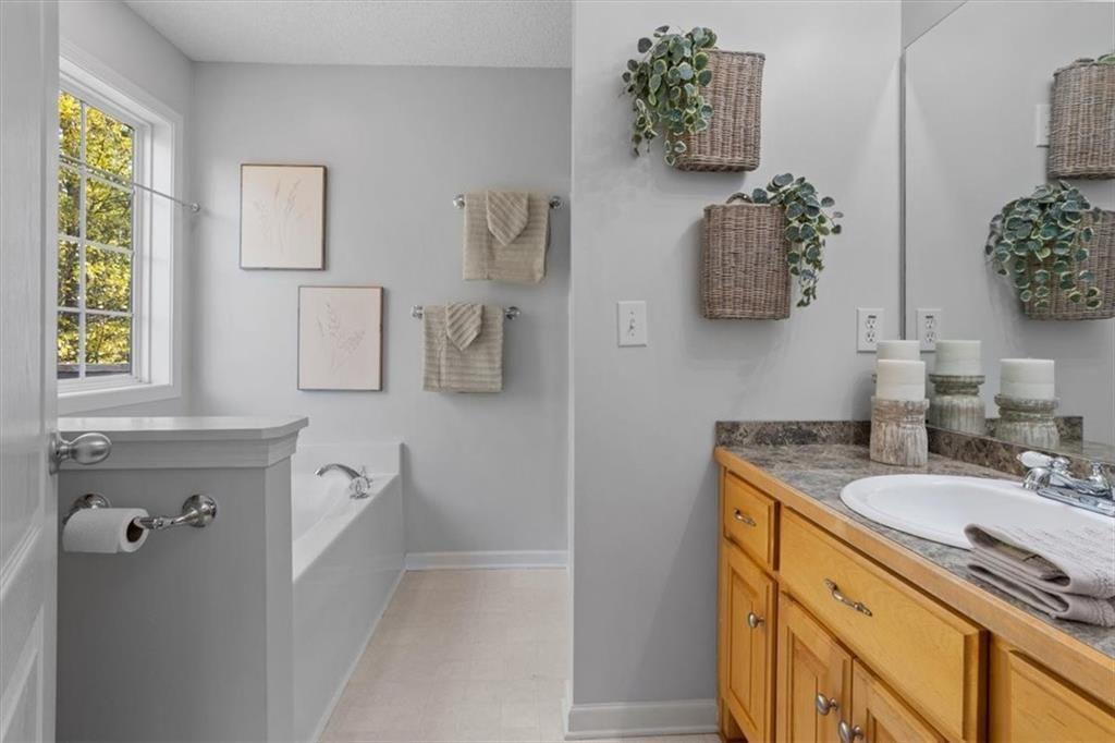 12 Moorings Run Jasper, GA 30143 - Photo 20 of 54 a bathroom with a sink vanity and mirror