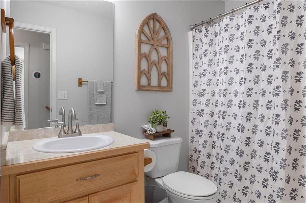 12 Moorings Run Jasper, GA 30143 - Photo 25 of 54 a bathroom with a toilet sink and mirror