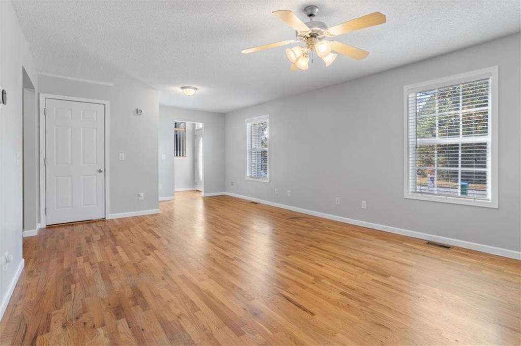 12 Moorings Run Jasper, GA 30143 - Photo 30 of 54 a view of empty room with wooden floor and fan
