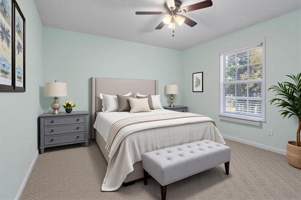 12 Moorings Run Jasper, GA 30143 - Photo 33 of 54 a spacious bedroom with a bed and a window