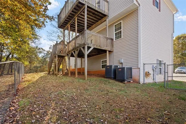 a backyard of a house with lots of green space