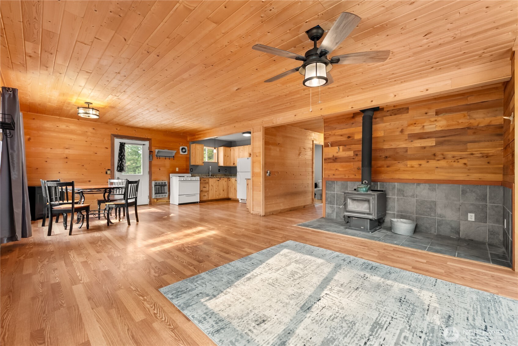 56 Ruby Two Moons Road Tonasket, WA 98855 - Photo 15 of 40 a view of a livingroom with furniture an empty room and chandelier fan