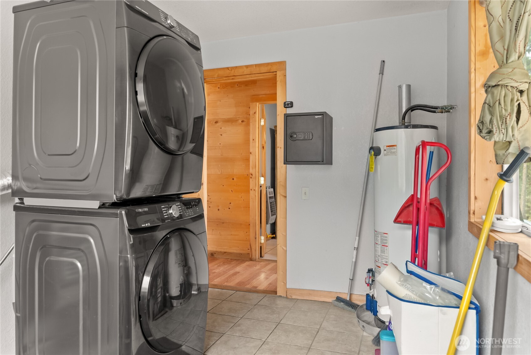 56 Ruby Two Moons Road Tonasket, WA 98855 - Photo 26 of 40 a view of walk in closet with clothes and shoes