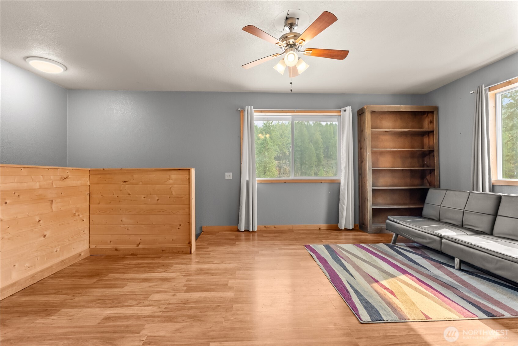 56 Ruby Two Moons Road Tonasket, WA 98855 - Photo 30 of 40 a view of livingroom with furniture and a window