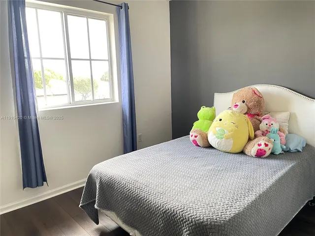 a view of a utility room with windows