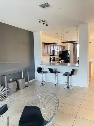 a bedroom with furniture and a fireplace