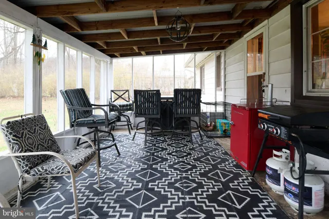 a outdoor dining space with furniture