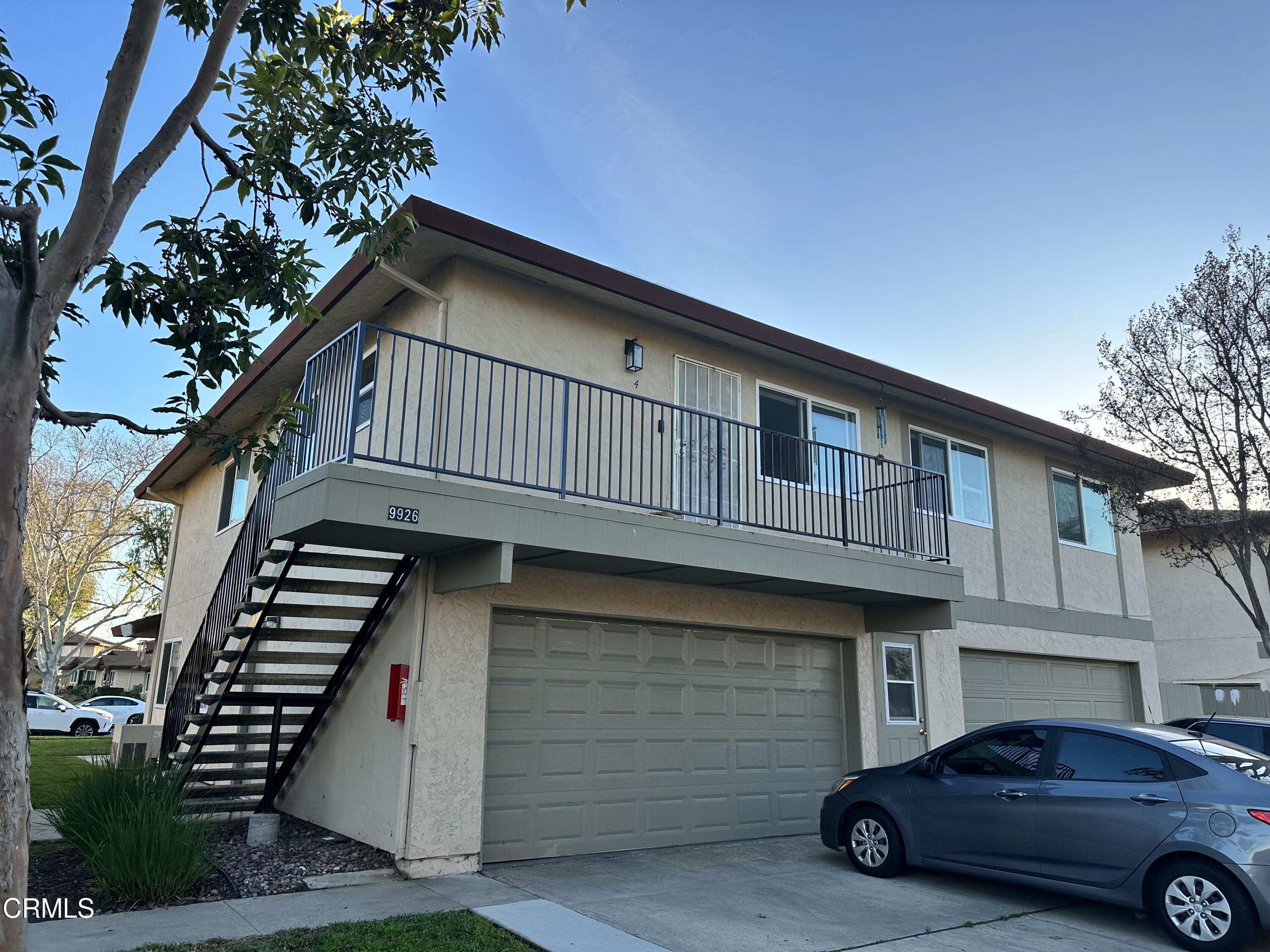 9926 Mission Vega Road, Unit 4 Santee, CA 92071 - Photo 1 of 22 a car parked in front of a house