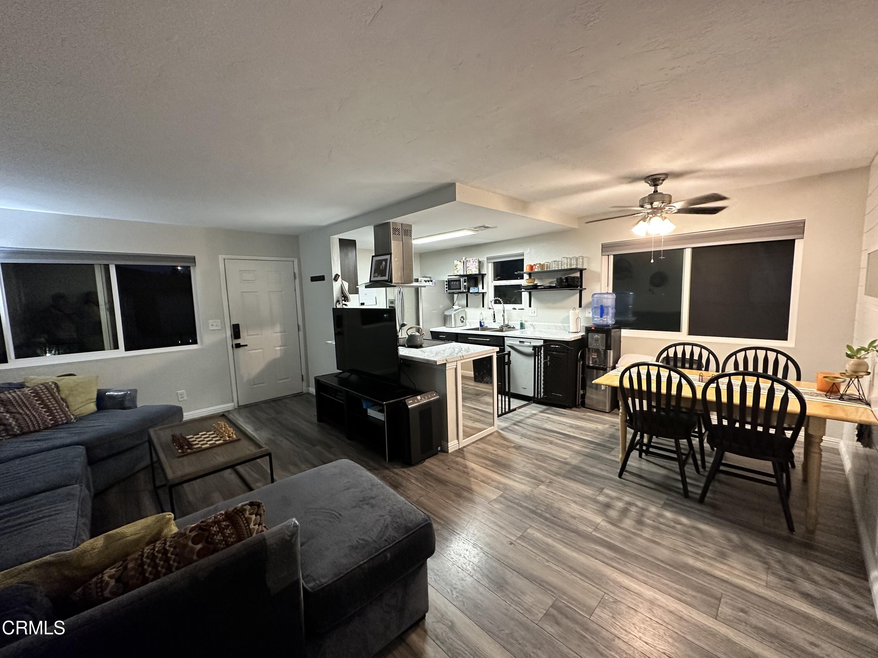 9926 Mission Vega Road, Unit 4 Santee, CA 92071 - Photo 6 of 22 a living room with furniture and a flat screen tv